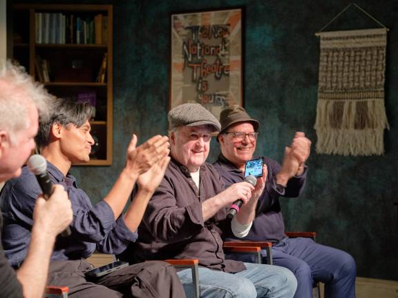 Director Anthony DiMieri phoned in while in the back of a yellow cab to join the Q&amp;A with the show’s stars including cab drivers John McDonagh (second from right) and Seth Goldman (far right) on the stage.