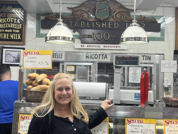 Karen King, owner of Alleva Dairy, who was worried that she would have to close the 103 year old store that is billed as the country’s oldest cheese shop, will instead reopen a new larger store in Lyndhurst, N.J. Photo: Angela Barbuti.