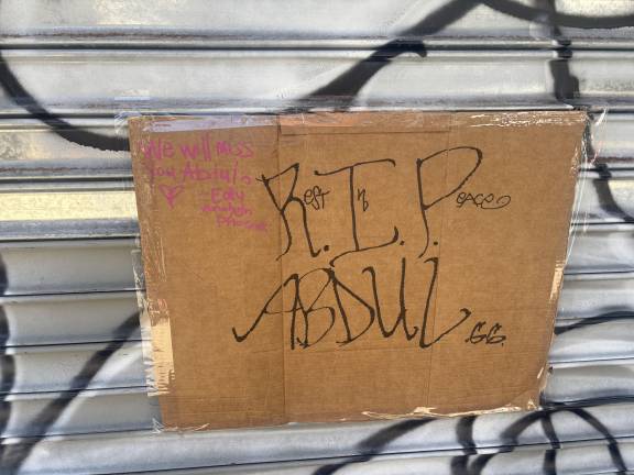 A handwritten sign outside Sal’s Deli &amp; Grocery is in memory of Abdul Saleh, a beloved neighborhood fixture who was killed after getting in a dispute with another man on April 25.
