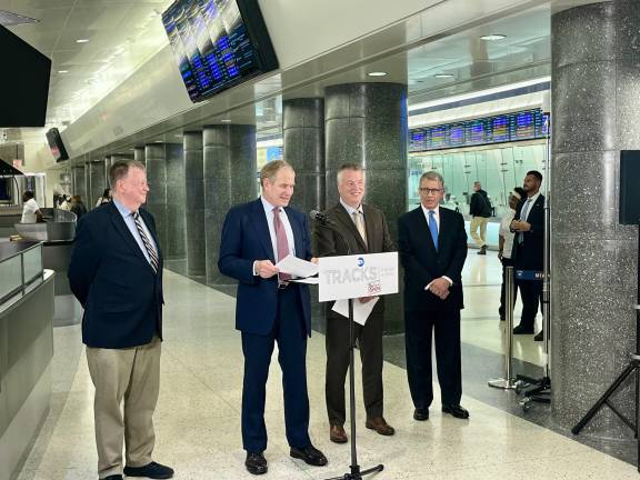On Sept. 2, Tracks Raw Bar and Grill at Grand Central Madison opened for business. To commemorate, speeches were given at a press conference. L-R, Bruce Caulfield, principal partner, Tracks; Janno Lieber, chair and CEO of the MTA; Rob Free, president, LIRR; and David Florio, MTA chief Real Estate Transactions and Operations Officer.