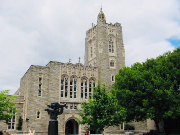 The Firestone Library holds some of the 11 million volumes in the Princeton University Library network. Despite its classic look, it was opened in 1948. Photo: Ralph Spielman