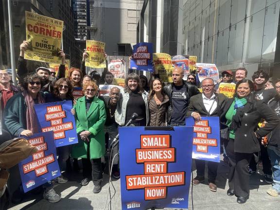 City Council Members Emily Gallagher and Julia Salazar (center) used the rally as an opportunity to push their Small Business Rent Stabilization Act, which could apply to businesses such as Jimmy’s Corner.