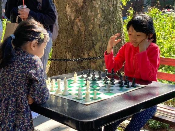 Chess players honing their skills. Photo courtesy of Unruly Queens