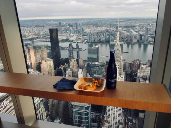 At Apres, the food offerings are tasty, the views are unique. Here, a snack and a beverage while contemplating the 1930 Chrysler Building, at one time the tallest building in the world. Photo: Ralph Spielman
