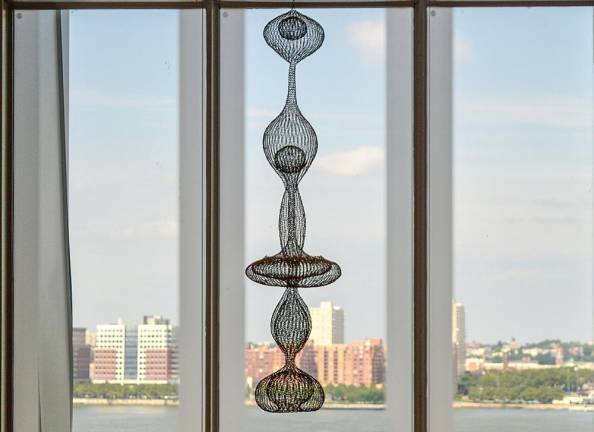 Ruth Asawa, Untitled (S.270, Hanging Six-Lobed, Complex Interlocking Continuous Form within a Form with Two Interior Spheres), 1955 is on view at the Whitney Museum of American Art. Photo: Adel Gorgy