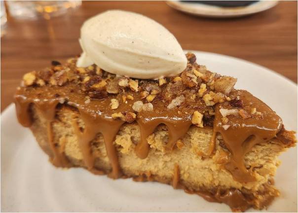 Dulce de leche cheesecake in on the dessert menu at Georgie’s, a new Chelsea hot spot.