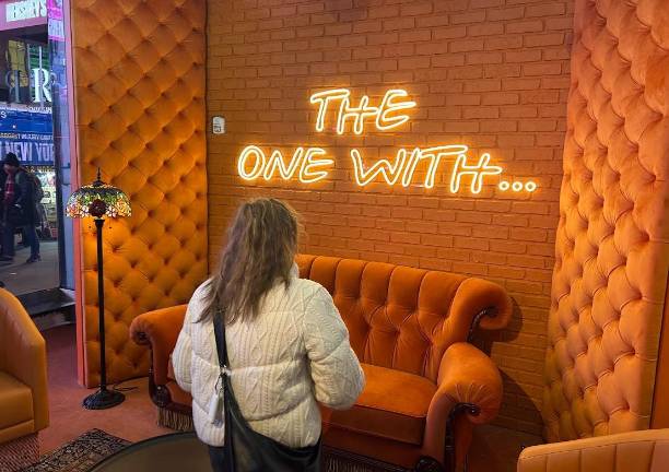 Though not trying to duplicate the fictional coffee shop “Friends,” the large orange couch is an exact replica of the one the cast used to sit on in the long running NBC comedy. The show is now in syndication where it uses the catch phrase: “the one with...to introduce the reruns.