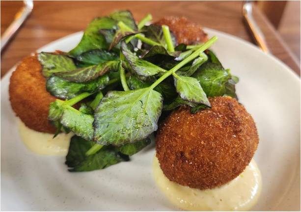 Crab fritters, another favorite on the varied menu at Georgie’s.