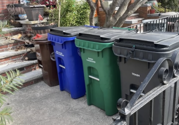 Compost, recycling and trash bins being used for Curbside Pickups. The Brown composting bin for food scraps is on the far left.