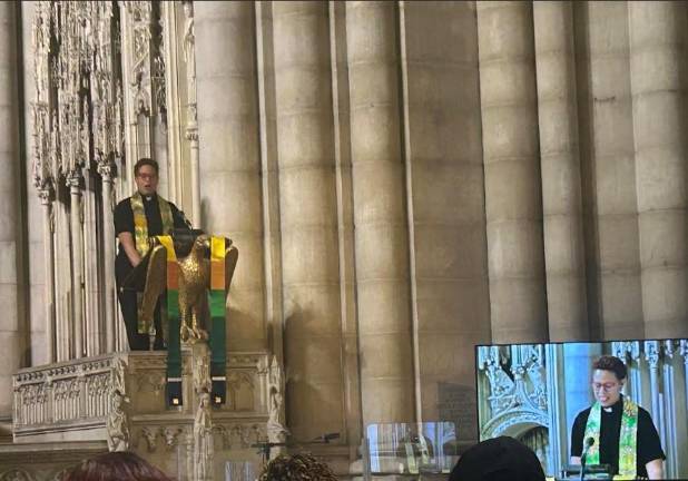 Rev. Adrienne Thorne, senior minister of the Riverside Church, addresses the congregation at a day long event called MLK NOW 2026. She’s standing in the same pulpit where Martin Luther King Jr. delivered his famous “Beyond Vietnam” speech in 1968 a week before he was assassinated.