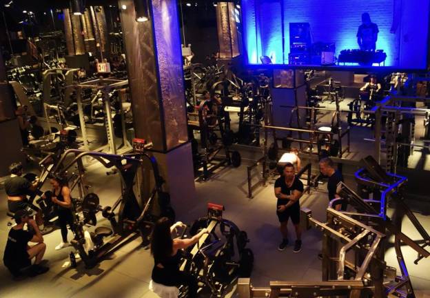 The new luxury gym that Barton is betting on once again combines cutting edge exercise equipment with a nightclub vibe with D.J.s Photo: Deborah Fenker