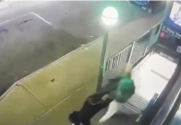 Blurry surveillance video allegedly shows Rhamell Burke shoving Ross Falzone down the steps of the Chelsea subway station at W. 18th Street and Seventh Ave. Falzone was a resident of W. 85th St.