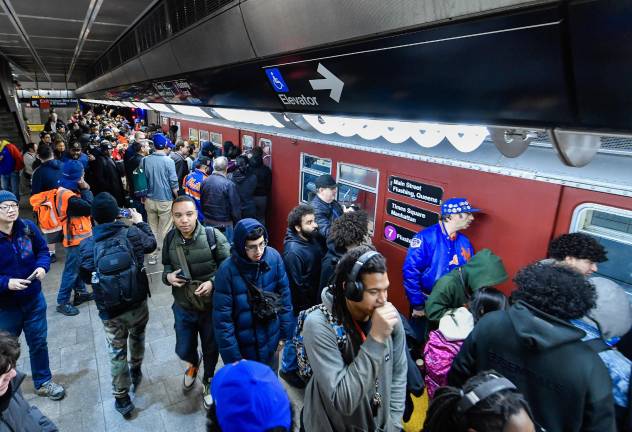 Nostalgia train of “Redbirds” runs from 34 St-Hudson Yards to Mets-Willets Pt on Thursday, Mar 26, 2026, opening day of the New York Mets’ baseball season.