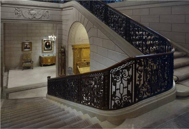 The grand staircase inside the Frick Collection. A five-year, $220 million renovation of the Gilded Age mansion, completed in April 2025 contains a 220-seat auditorium.
