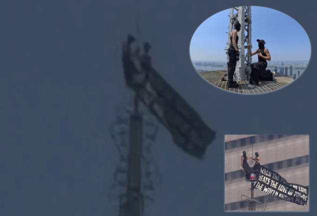 Two daredevil climbers who scaled the Empire State Building and unfulred a peace banner atop the building’s needle were arrested by the NYPD on July 1.