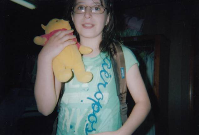 The author, age 11, at Camp Louise with her beloved Winnie the Pooh stuffed animal. Photo courtesy of Leah Foreman