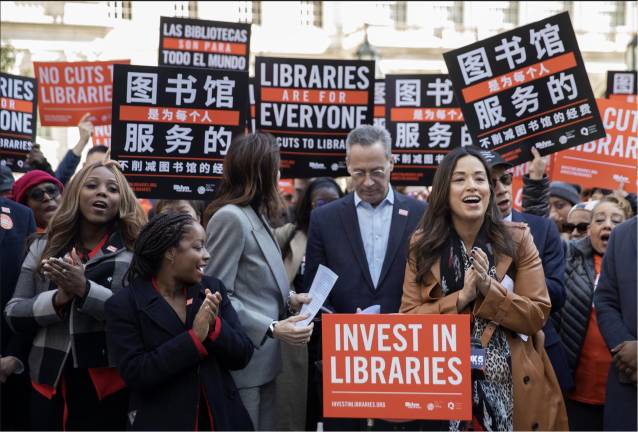 Carlina Rivera, right, at a rally in downtown Manhattan protesting cuts in funding to libraries.