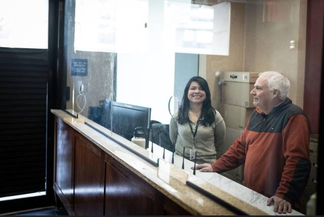 Front desk at the Hampton in turned homeless shelter next to Peck Slip School.