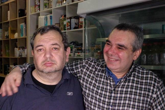 Hakan Cingir (left) and his brother Yelhan are battling to safe the family run café in Morningside Heights.