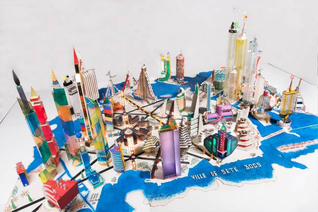 Bodys Isek Kingelez (Congolese, 1948-2015). &quot;Ville de S&#xe8;te 3009.&quot; 2000. Paper, paperboard, plastic, and other various materials, 31 1/2 &#xd7; 9' 10 1/8? &#xd7; 6' 10 11/16?. Collection Mus&#xe9;e International des Arts Modestes (MIAM), S&#xe8;te, France. &#xa9; Pierre Schwartz ADAGP; courtesy Mus&#xe9;e International des Arts Modestes (MIAM), S&#xe8;te, France