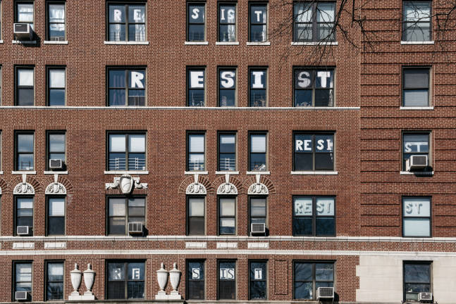 Residents of a 17-story co-op at 101st Street and Central Park West displayed their sentiments about the current administration. Photo: Joe Carrotta