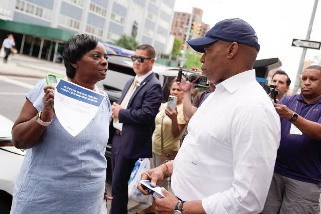 Mayor Eric Adams showed up to Harlem to talk with locals about the outbreak on August 6.
