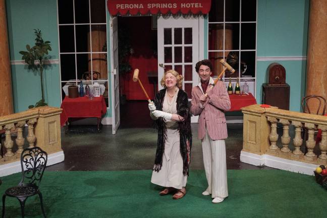 Daniel Yaiullo as Georgie Frobisher and Christine Weiss as Miss Frobisher playing croquet in <i>The Croquet Player </i>at Theater for the New City.