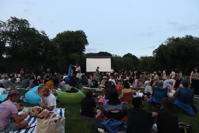 A crowd gathers on the Great Lawn for the sunset screening of the world premiere.