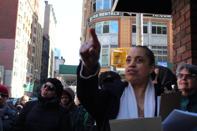 Cher Carden, a board member of Save Chelsea, highlighting touchstones of the neighborhood's African-American community, which thrived during the late 1800s and early 1900s. Photo: Lily Haight