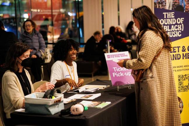 Lincoln Center employees check audiences in for the evening’s performance. Designed for children, teens and adults with disabilities and their families, <i>Passport to the Arts</i> provides a welcoming, accessible, and cost-free introduction to the performing arts at Lincoln Center. Photo: Sachyn Mital/ Lincoln Center