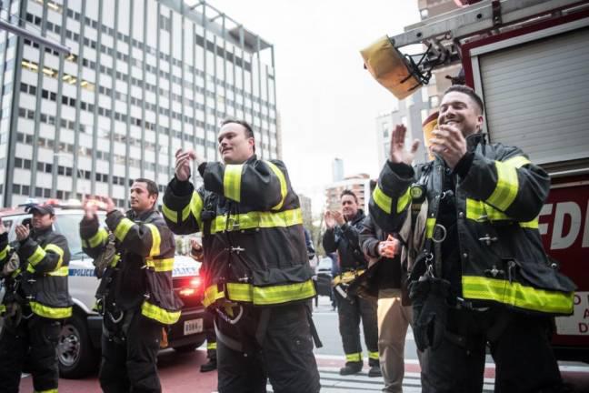 Firefighters applaud medical staff at NYC Health + Hospitals/Bellevue on Friday, April 10, 2020 during a visit by Mayor Bill de Blasio to thank health workers. Photo: Michael Appleton/Mayoral Photography Office