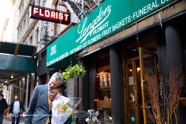 First lady Chirlane McCray, holding a bouquet of wildflowers, and Mayor Bill de Blasio pay a fond farewell to Langdon Florist near City Hall on February 27. The 71-year-old institution &#x2013; which they've patronized for more than a quarter-century and which supplied the flowers for their wedding in 1994 &#x2013; is relocating to Staten Island. Photo: Benjamin Kanter, via&#xa0;Mayoral&#xa0;Photo&#xa0;Office