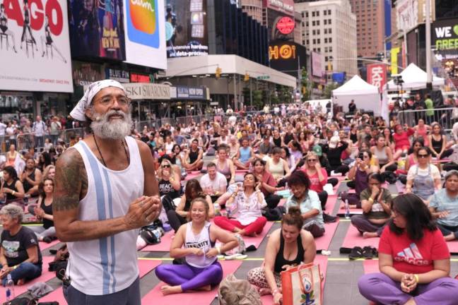 Summer Solstice Yoga: Mind Over Madness event with Marco Rojas concluding his 1:30 p.m. class. Photo: Beau Matic