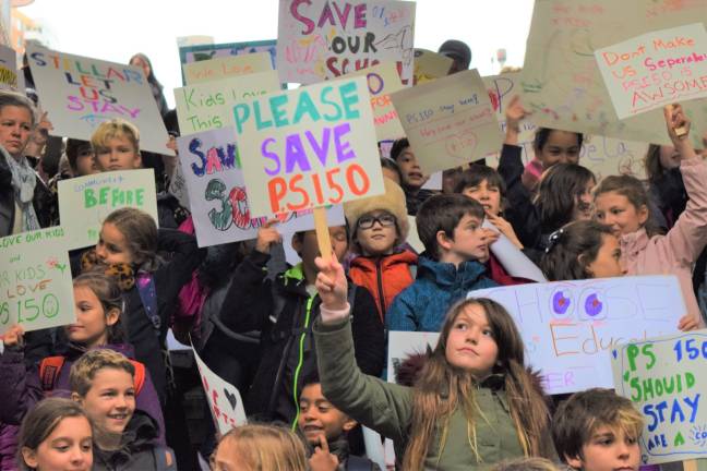 P.S. 150 students gathered Nov. 13 to plea for their school to remain in its current home. Photo: Michael Garofalo
