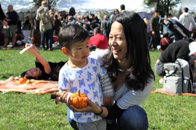 Kumiko Takeshita and her son found the perfect little pumpkin.