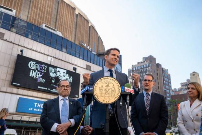 City Council Member Erik Bottcher (at mic), who represents the district in which Madison Square Garden sits, at a press conference on Sept. 12 urging a new Penn Station plan. He is flanked by (from left) Congressman Gerald Nadler, Borough President Mark Levine and Layla Law-Gisiko, the chair of the CB5 Land Use Committee. Photo: Office of the Borough President