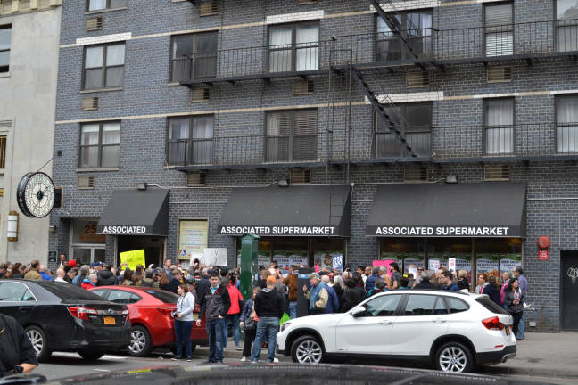 Chelsea residents protested last spring over the closure of one of the only affordable suppliers of fresh food in the neighborhood. Photo: Madeleine Thompson