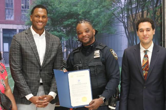 Police Offier Donovan Waithe honored Black History Month celebration at Africsan National Burial Ground, Feb. 21, 2026.