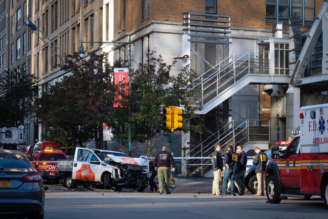 NYPD and FBI personnel at the scene of Tuesday afternoon's attack that killed eight people. Edwin Torres/Mayoral Photo Office.