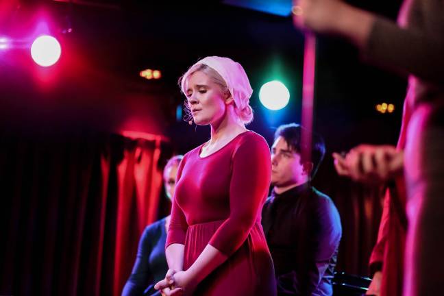 Samantha Stevens onstage in the musical parody of &#x201c;The Handmaid&#x2019;s Tale&#x201d; that she created. Photo: Heather Gershonowitz