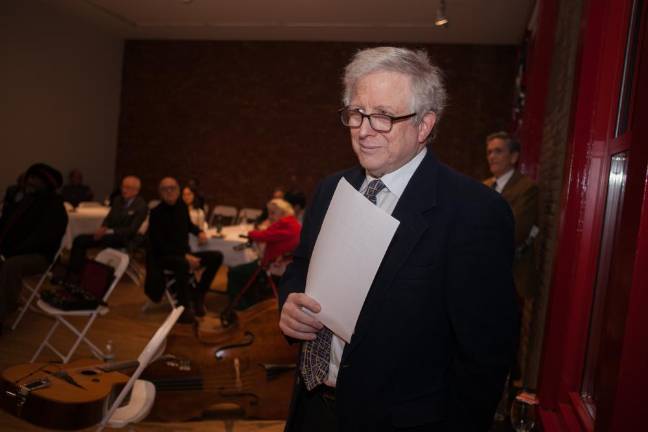 Robert W. Snyder, the new Manhattan borough historian, addresses some 200 community activists, neighborhood leaders and local historians at the Fire Museum on Spring Street for a Dec. 3 reception.