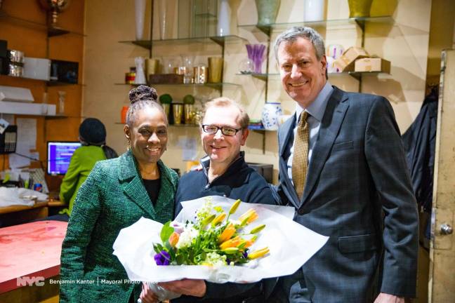 Joe Rizzo, the owner of Langdon Florist in Tribeca, holds a bouquet of wildflowers he prepared for two of his longtime customers,&#xa0;first lady Chirlane McCray and Mayor Bill de Blasio,&#xa0;during a farewell visit they paid to the shop near City Hall on February 27. He is relocating the 71-year-old institution to Staten Island and shuttered the shop at 62 Reade Street earlier this month.&#xa0;Photo: Benjamin Kanter, via&#xa0;Mayoral&#xa0;Photo&#xa0;Office
