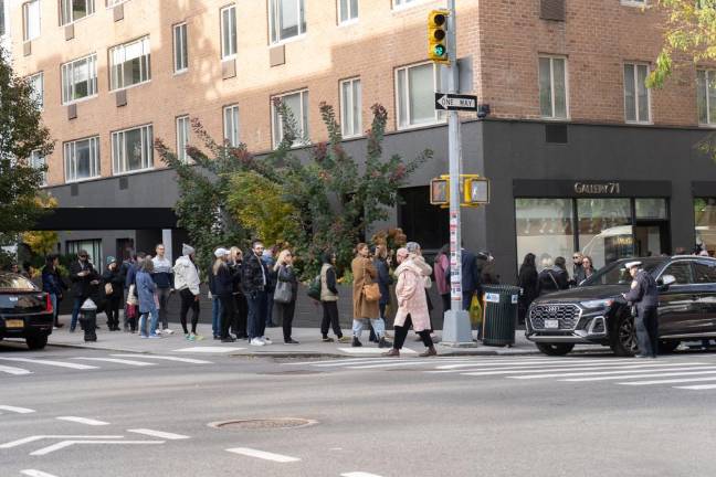 Outside Caffe Aronne, a long line of supporters that stretches across the block. (Priyanka Rajput)