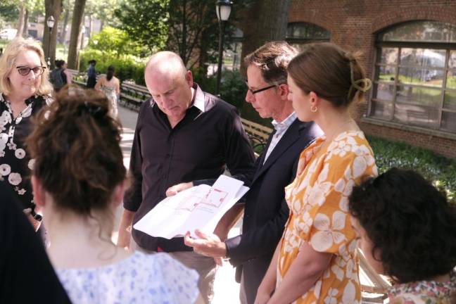John Grove, the principal in charge of the project at Reed Hildebrand showing press members the visual landscape changes of the park on the tour on Thursday, July 13 at 200 Central Park W. on the UWS. Photo: Beau Matic.