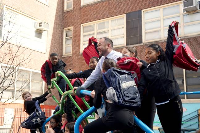 New York City Council Speaker Corey Johnson, who represents Chelsea on the City Council, celebrates the opening of the student-designed playground at P.S. 33-Chelsea Prep along with students. Photo: Gaspard Le Dem