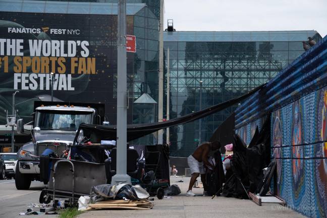 A covered encampment was constructed along West 36th Street, just a block north of the Javits Convention Center.