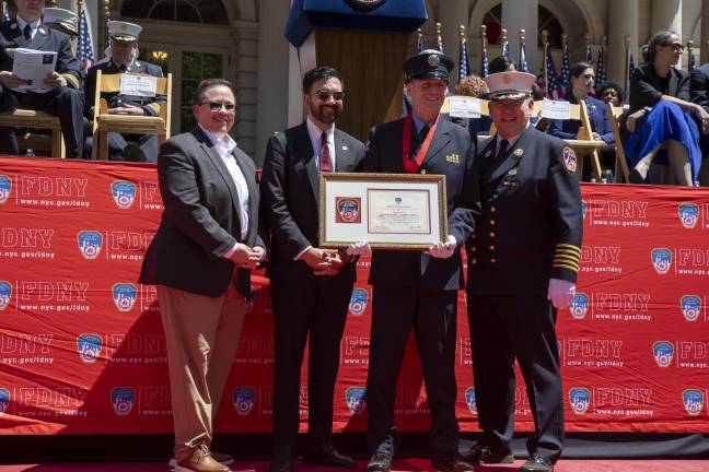 James M. Lafferty was presented with the John H. Prentice medal for his heroic actions at a December 9 , 2025 fire during the annual FDNY medal ceremony.