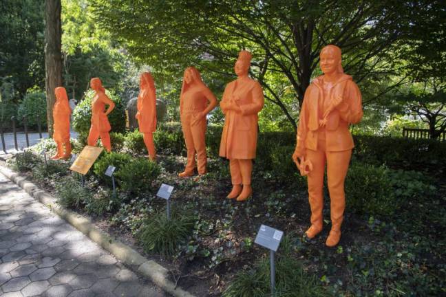 Statues of women working in wildlife conservation, at the Central Park Zoo. Photo: Julie Larsen Maher