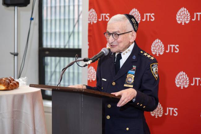 Challah left, Alvin Kass right: His kippah, or yarmulke, is embroidered “Rabbi Dr. A. Kass, Chief Chaplain.”