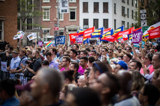Hundreds gathered Sunday by the Stonewall Inn on Christopher Street, where the gay rights movement was launched in 1969. Photo: Adrian Cabrero (mustagrapho.com), via Flickr
